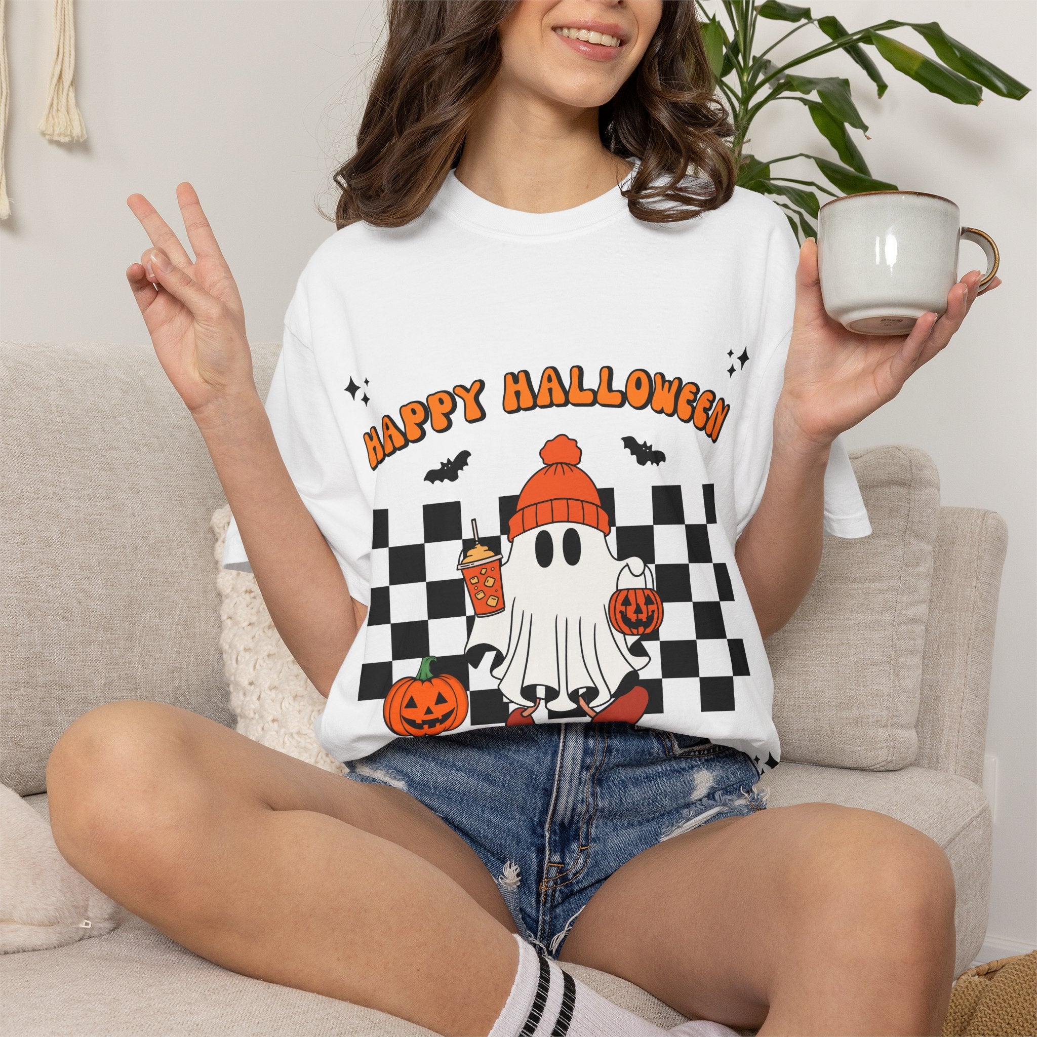 Cute Ghost Holding Pumpkin and Coffee T-shirt | Happy Halloween Checkerboard